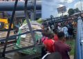 BREAKING: Tragedy Strikes Aba, Abia State as Collapsing Billboard Claims Lives Damages Property